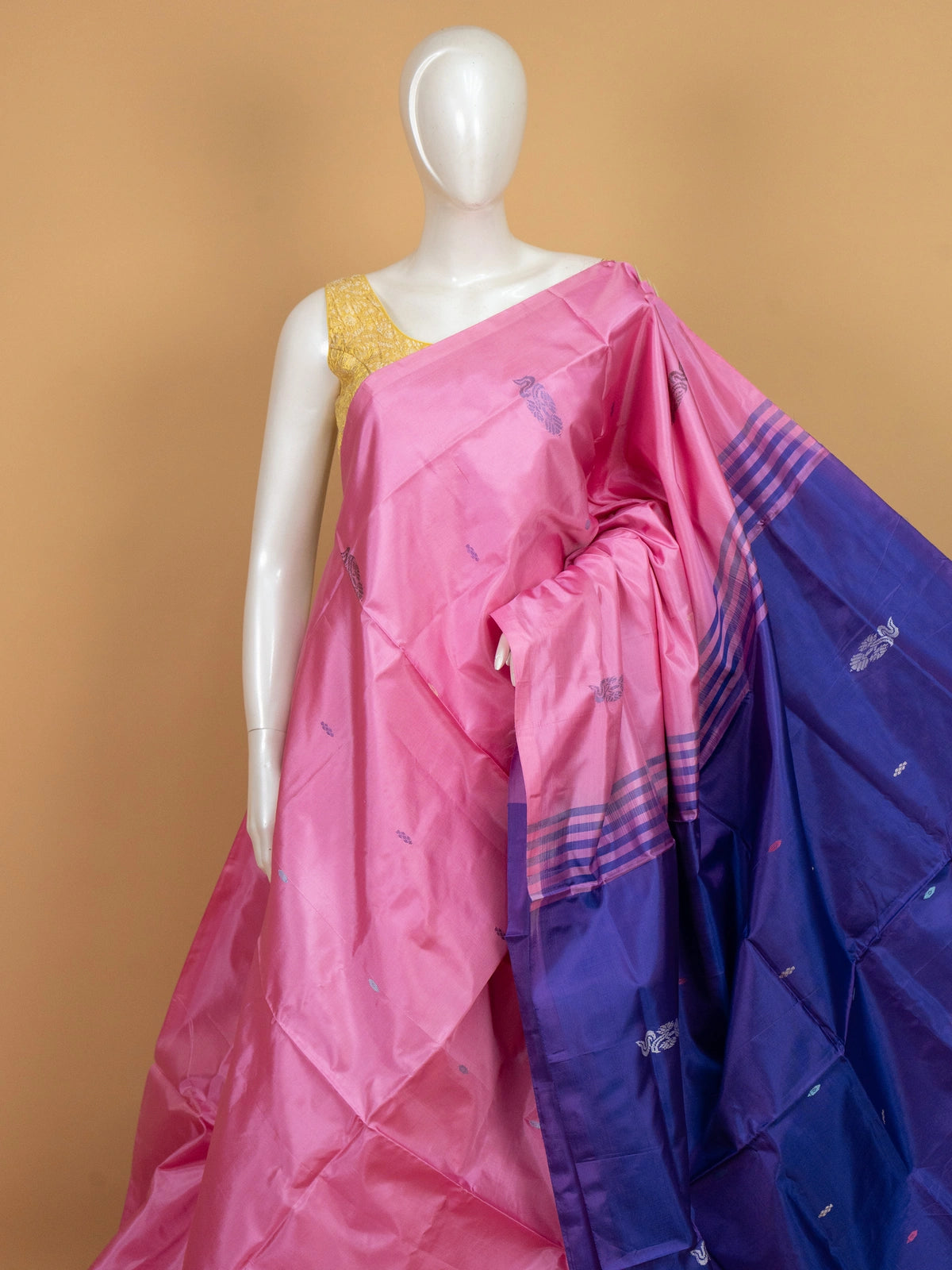 Pink banana silk saree with contrast blue pallu, butta motifs and striped border