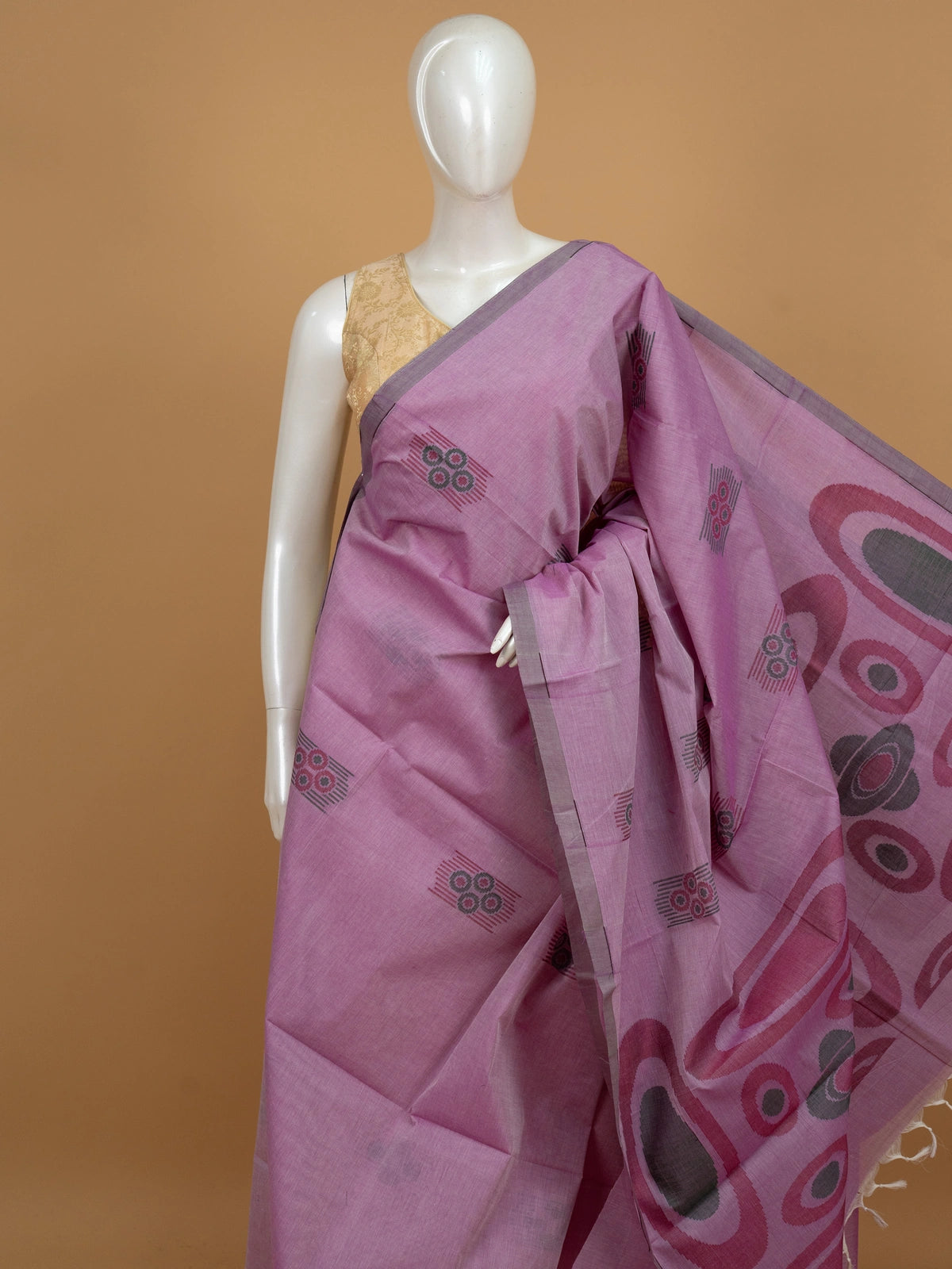 Mauve silk cotton saree with grey contrast border and woven circular buttas