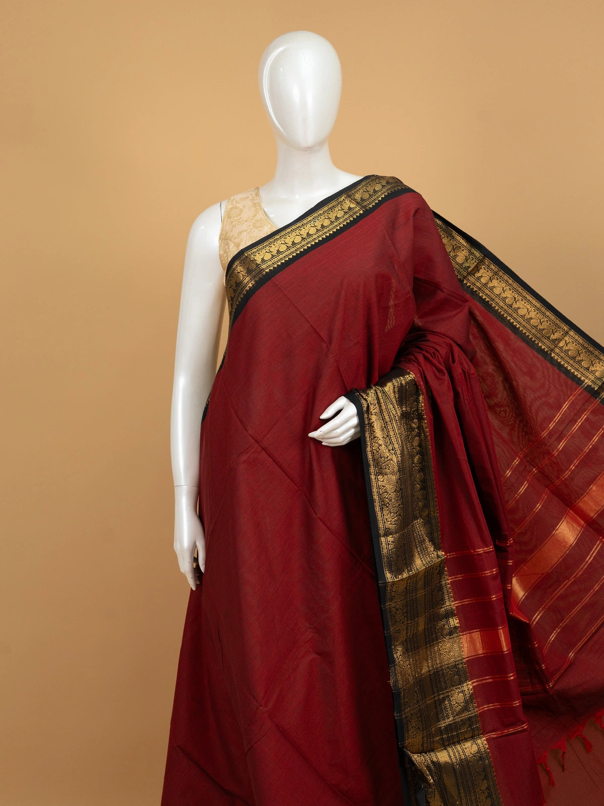 Maroon Chettinad cotton saree with black and gold zari contrast border