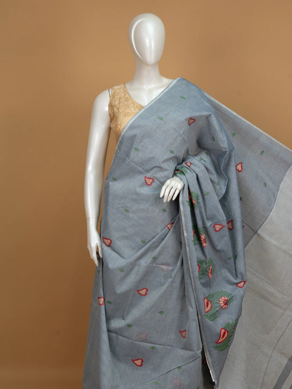 Grey linen cotton saree with red and cream floral buta motifs and striped pallu