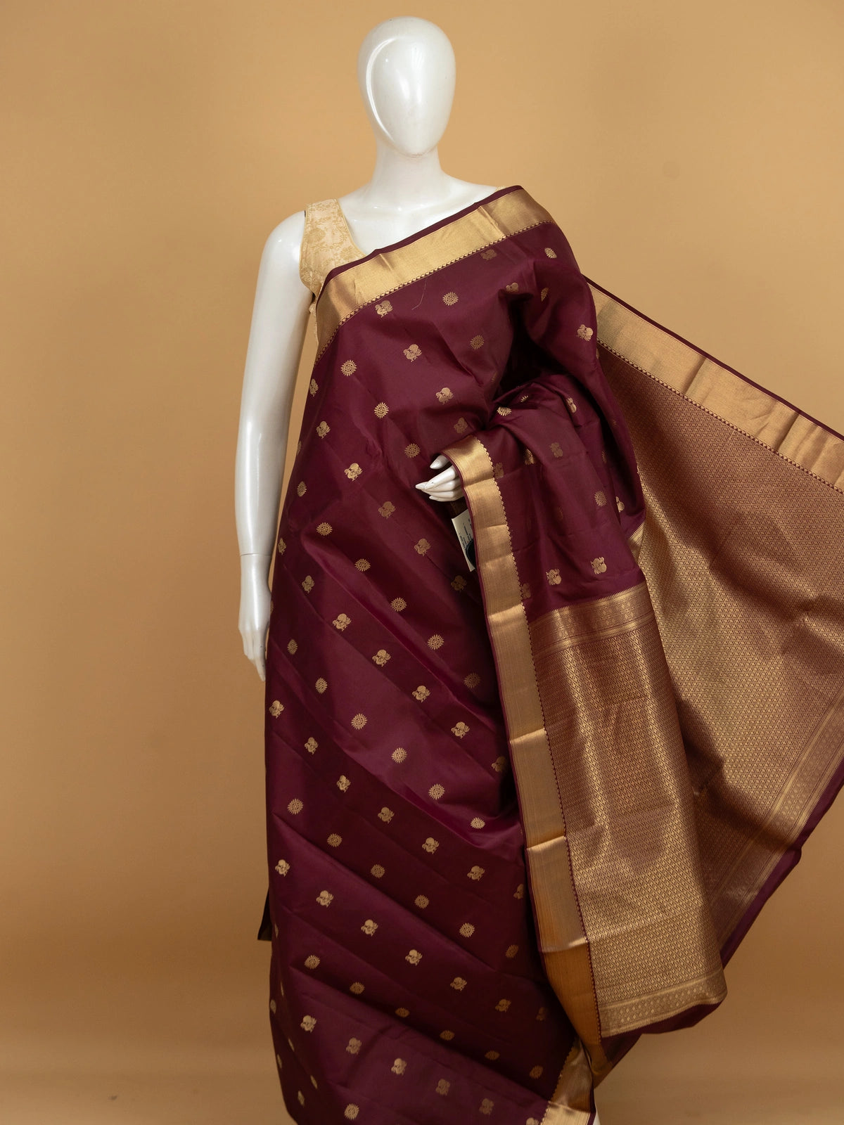 Maroon pure Kanchipuram silk saree with gold zari buttas and contrast zari border