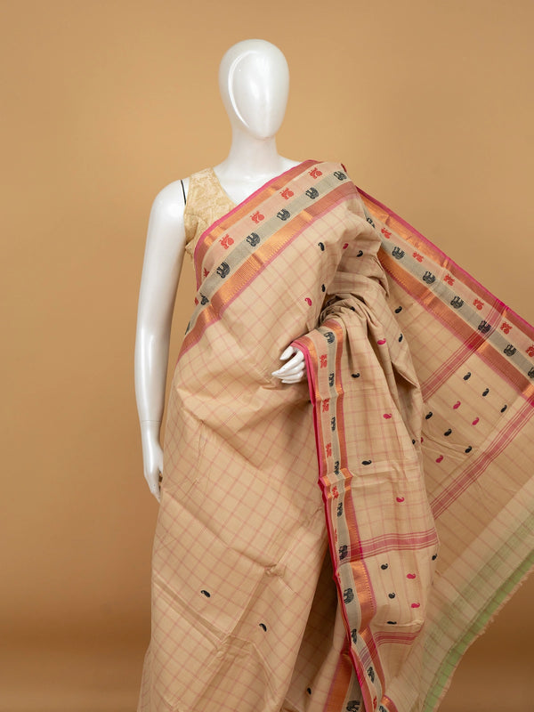 Beige and pink checked Chettinad cotton saree with gold zari border and paisley buttas