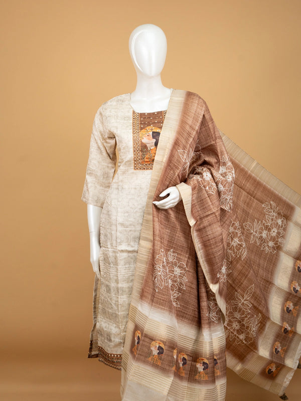 Beige tussar silk straight cut kurti set with artistic printed yoke and contrasting brown embroidered dupatta