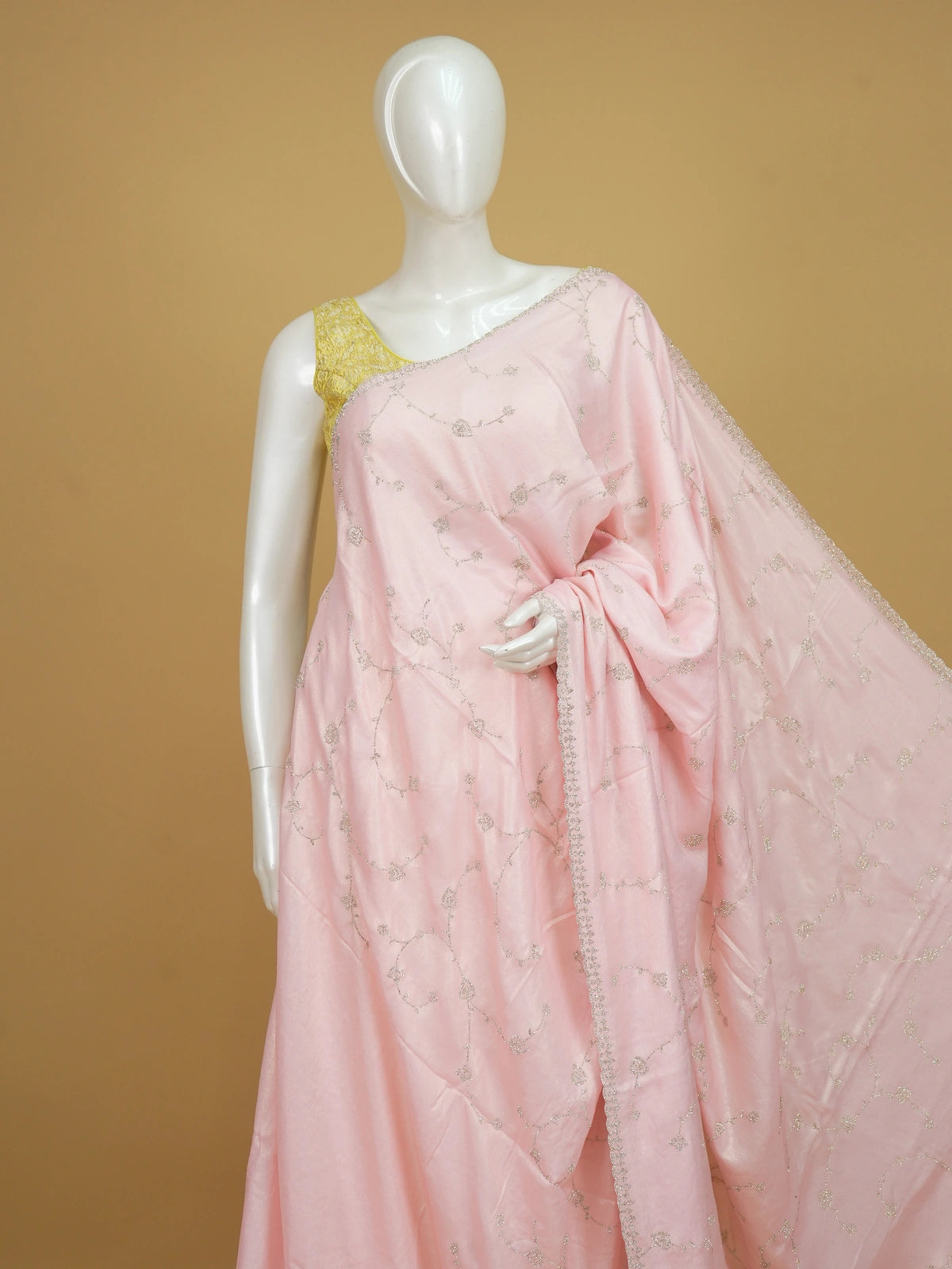 Soft pink designer saree with silver stonework floral vine embroidery and scalloped border