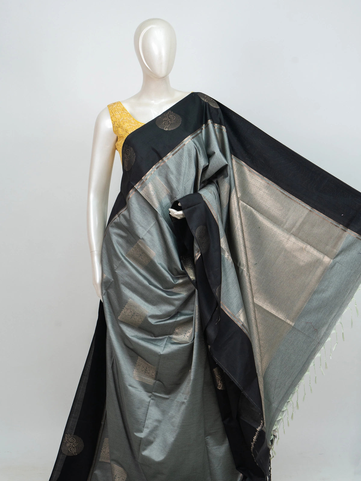 Grey and black Kanchipuram fancy silk saree with copper-gold zari butta motifs and contrast zari border