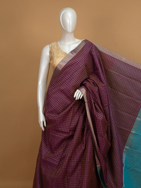 Wine purple checked linen cotton saree with contrast teal pallu and border