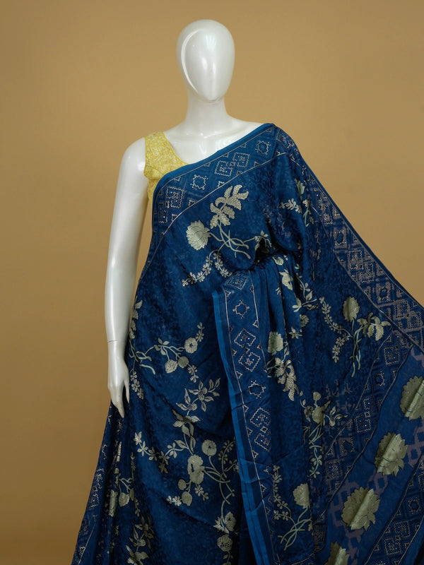 Navy blue and gold designer saree with floral lotus motifs and geometric border