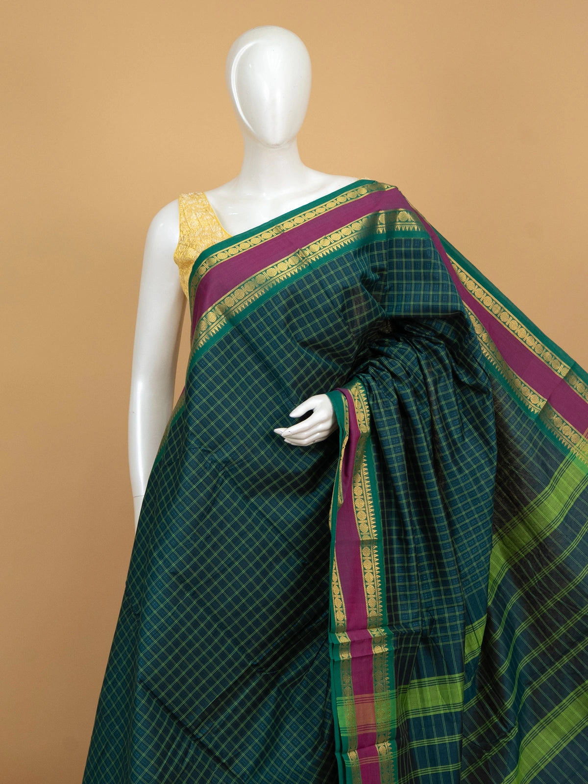 Teal green Chettinad cotton saree with checked body, magenta contrast gold zari border and matching pallu