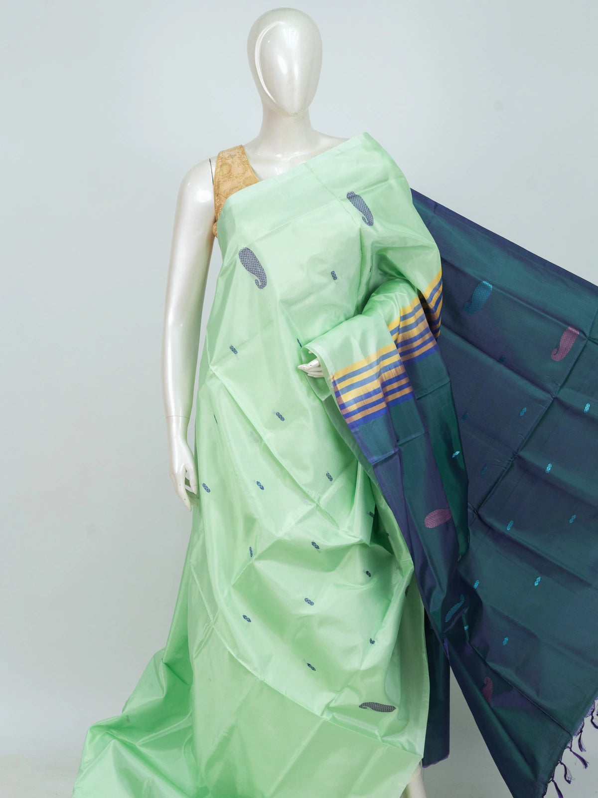 Mint green and blue Banana Silk saree with paisley buttas, contrast pallu and striped border