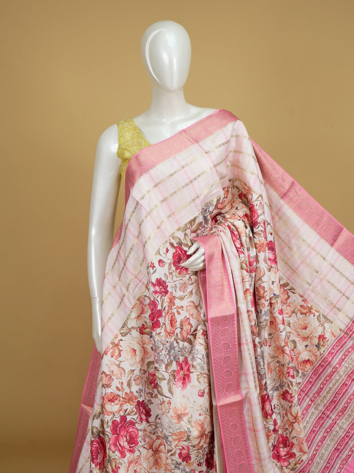 Off-white and pink floral semi tussar saree with gold zari stripes and contrast pink zari border