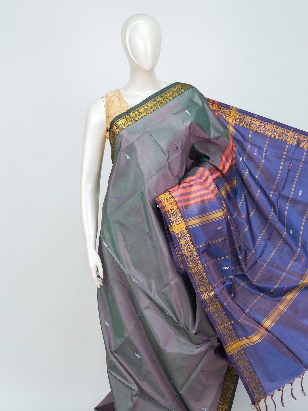 Dual-tone grey and blue banana silk saree with gold zari border and striped blue pallu