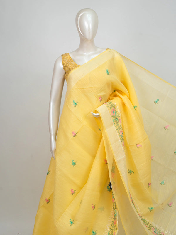 Yellow linen cotton saree with embroidered paisley buti motifs and gold zari border
