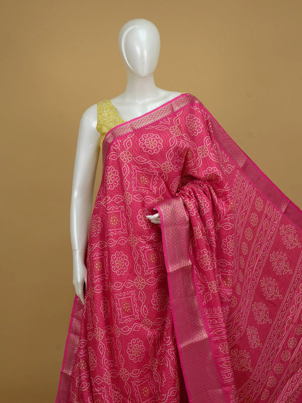 Pink Dola silk saree with cream bandhani-style print and contrast zari diamond border