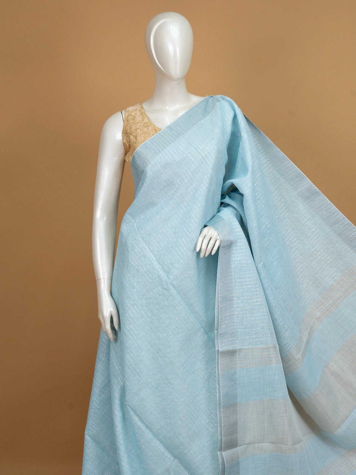 Sky blue linen cotton saree with fine silver zari stripes and matching blouse