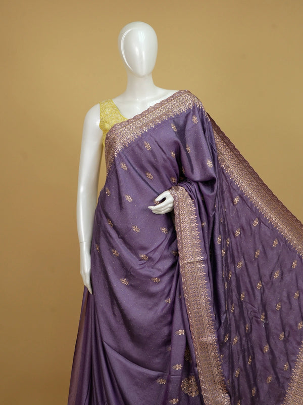 Mauve purple designer saree with gold embroidered floral butis and ornate zari border