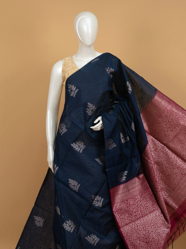 Navy blue silk cotton saree with silver butta motifs and contrast maroon pallu and border