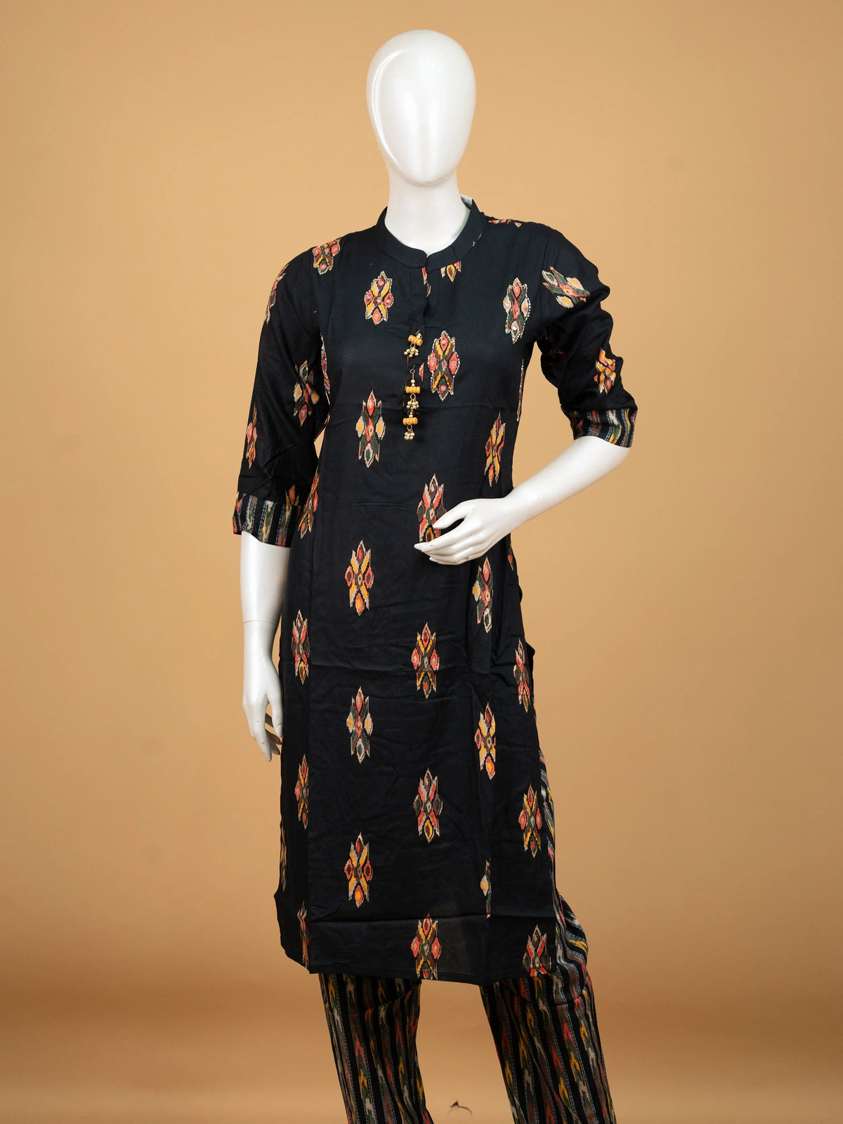 Black ikat print cotton co-ord kurti set with mirror work and matching printed pants