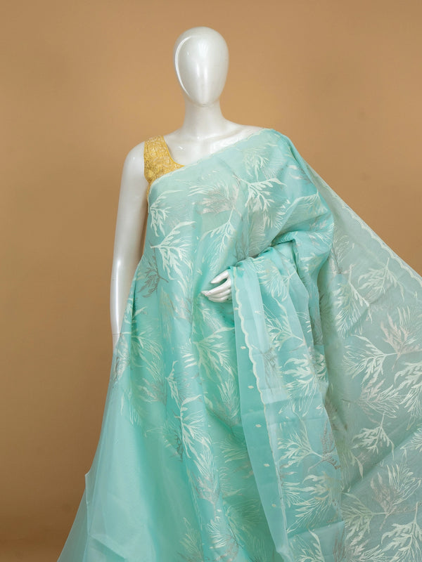 Aqua sea green organza designer saree with silver leaf embroidery and scalloped border