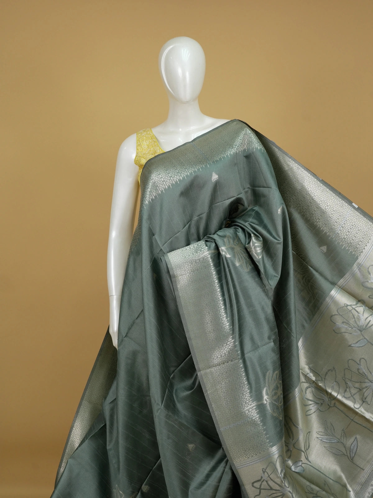 Sage grey semi tussar saree with silver zari floral pallu and border