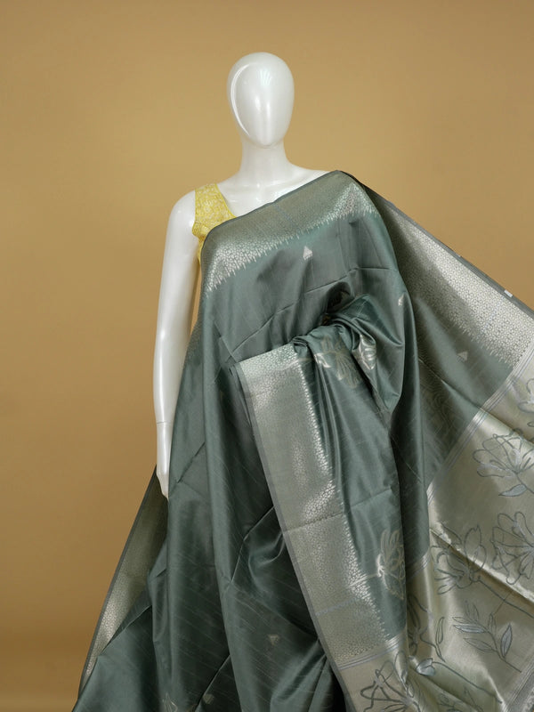 Sage grey semi tussar saree with silver zari floral pallu and border