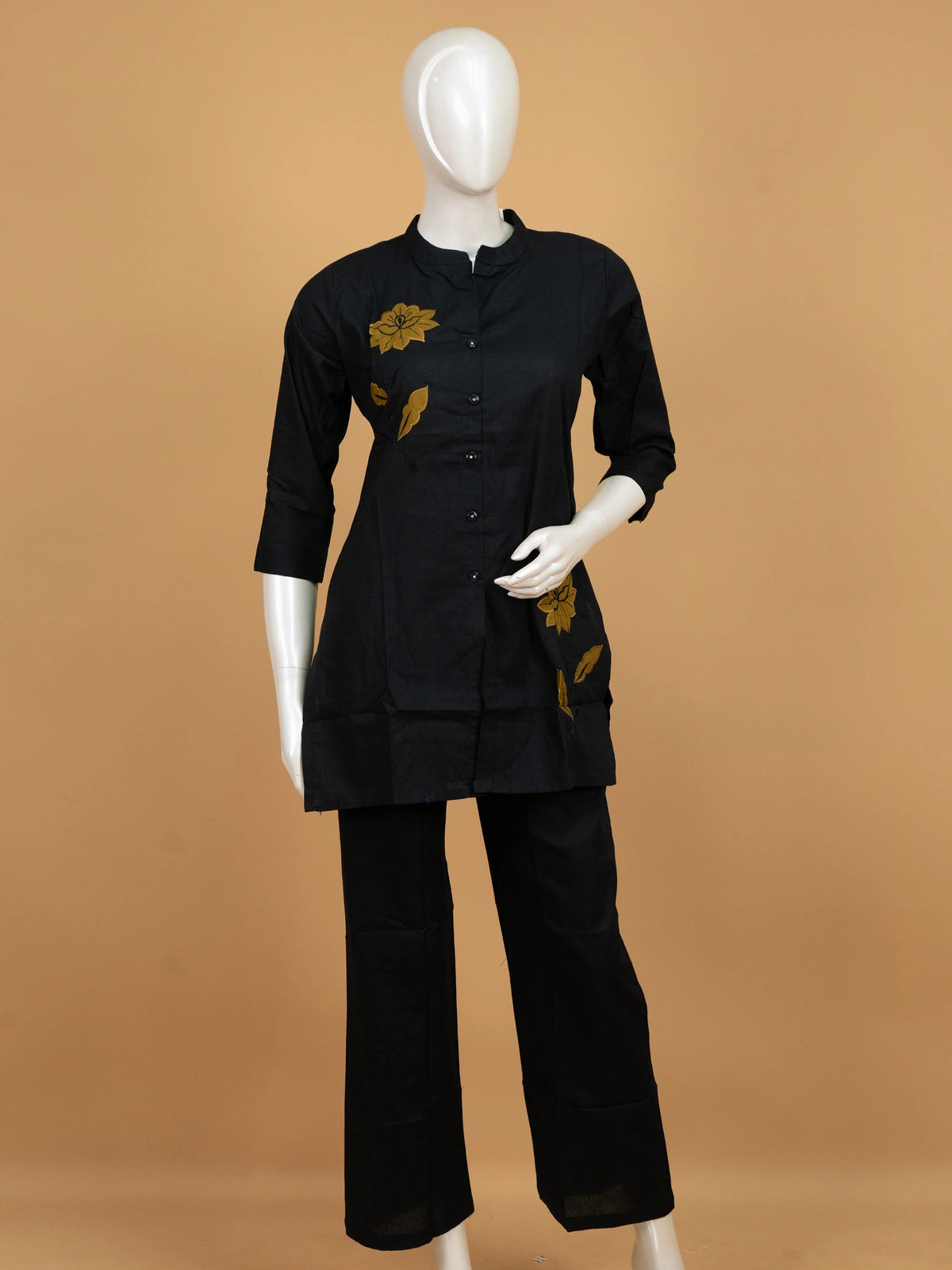 Black cotton co-ord set with mustard floral appliqué kurti and straight pants