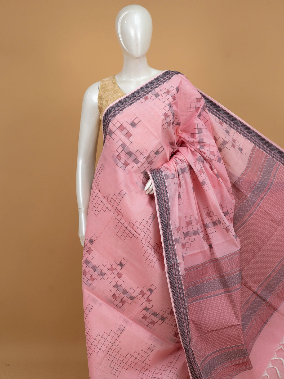 Pink silk cotton saree with grey geometric motifs and contrast border