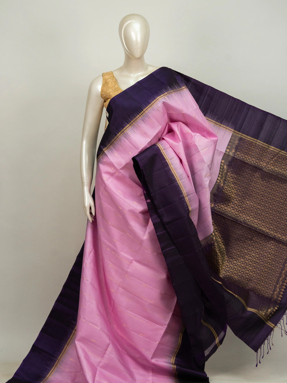 Pink pure soft silk saree with dark purple contrast temple zari border and gold zari brocade pallu