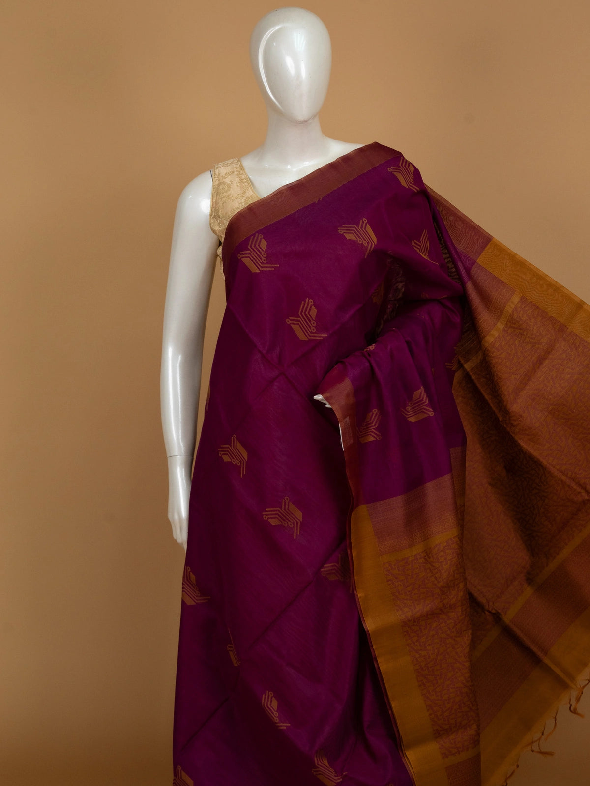 Magenta purple pure silk cotton saree with contrast mustard border, geometric gold buttas and tasselled pallu