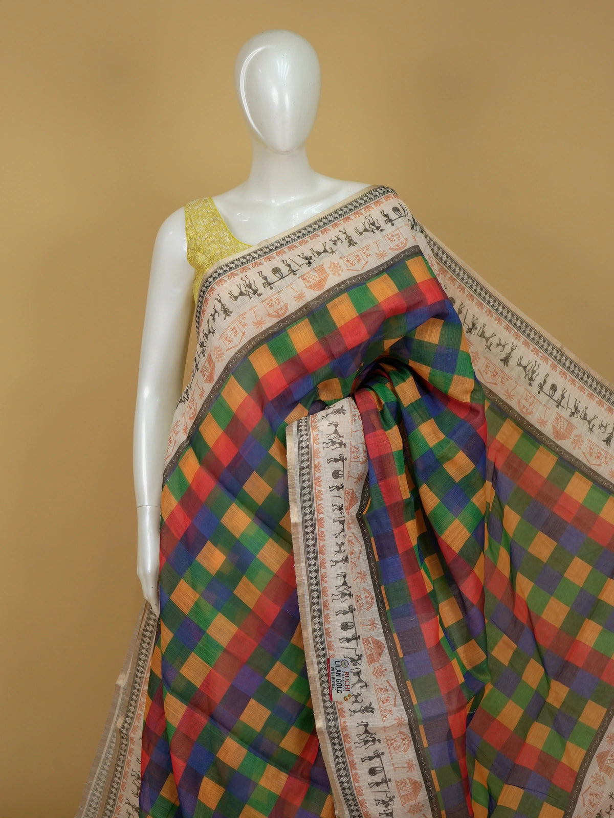 Multicolour checked linen cotton saree with cream Warli tribal-print border and contrast yellow blouse