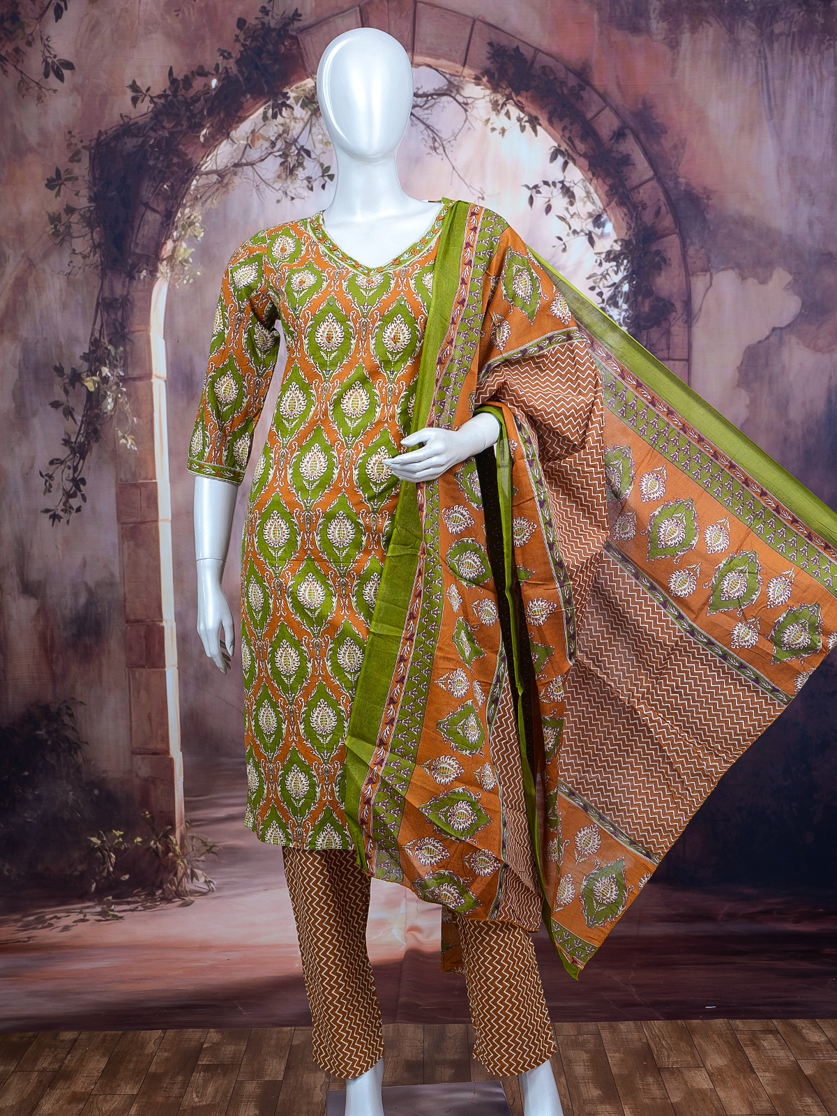 Orange and green printed cotton kurti set with straight pants and contrast green border dupatta