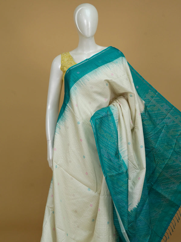 Cream and teal Dola silk saree with contrast temple border, floral buttas and patterned pallu
