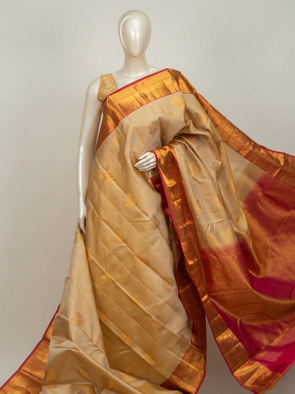 Cream pure Kanchipuram silk saree with gold zari buttas and contrast orange-red zari border