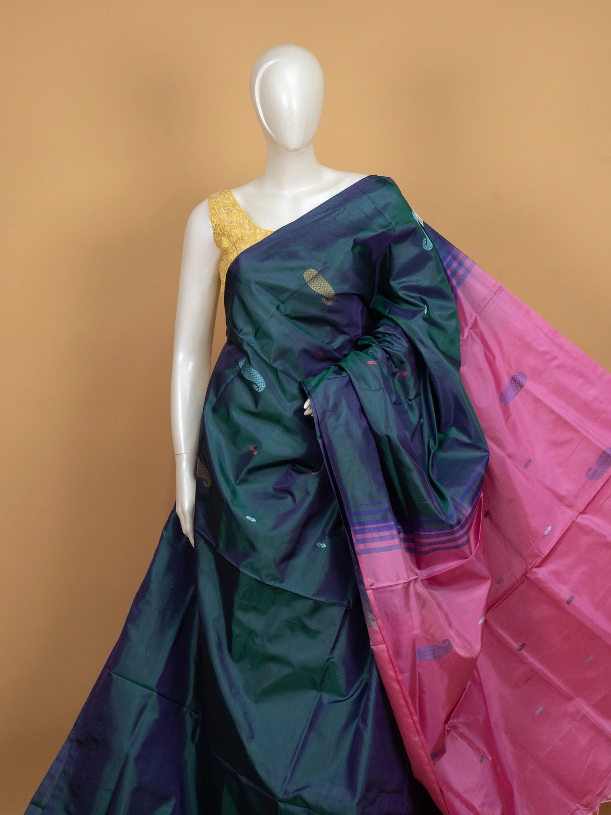 Teal green and pink banana silk saree with paisley buttas and contrast pink pallu