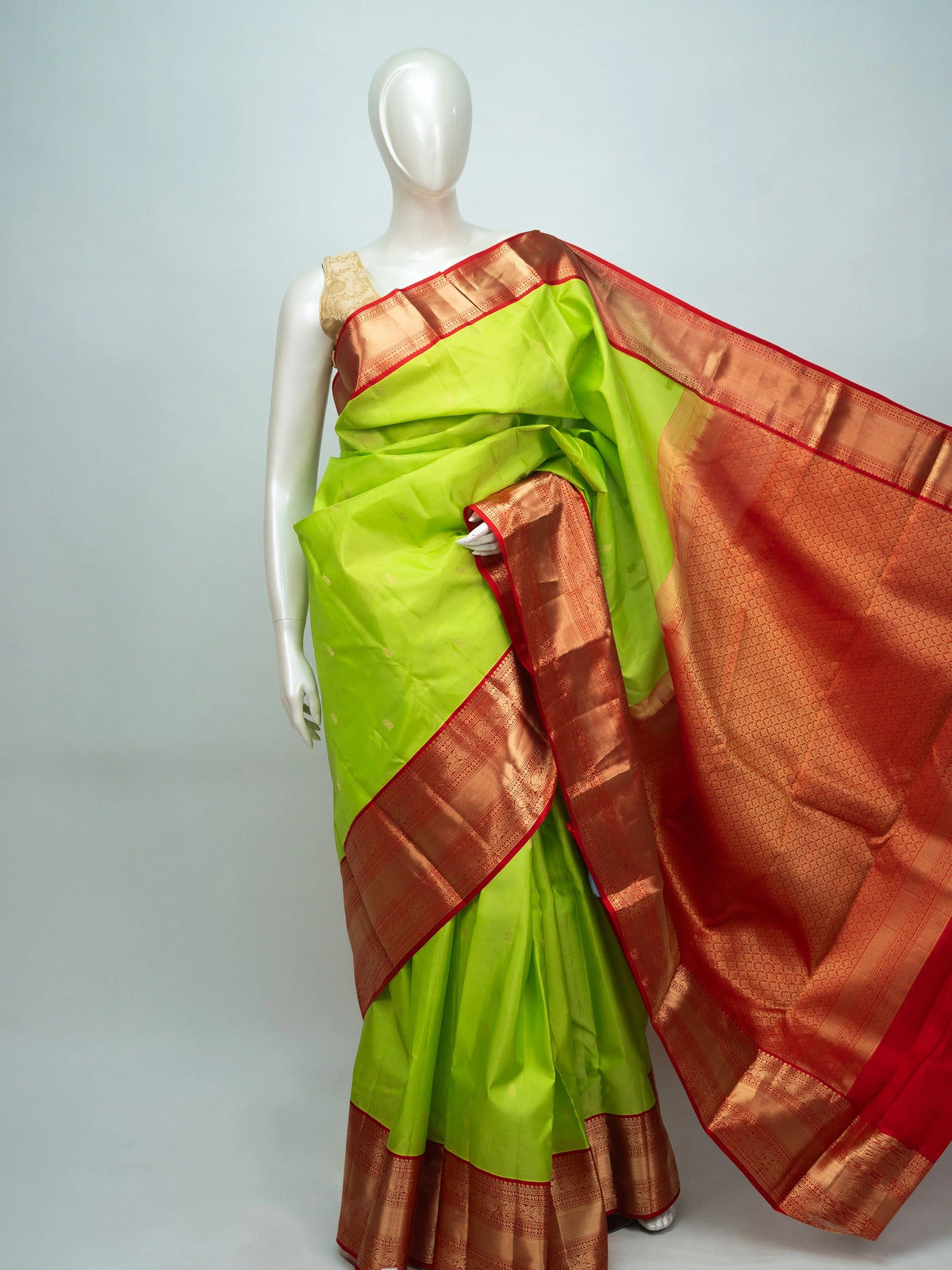 Parrot green pure Kanchipuram silk saree with contrast red gold zari border and pallu