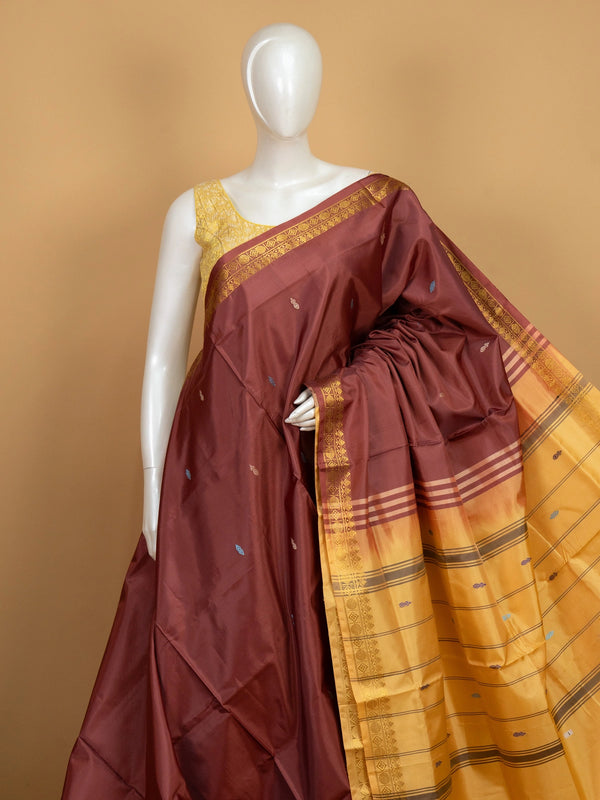 Maroon banana silk saree with mustard contrast pallu and gold zari border