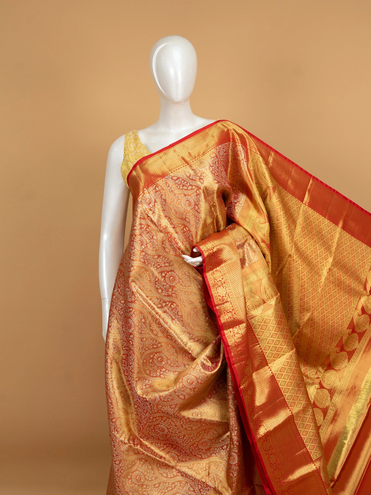 Orange-gold pure Kanchipuram silk saree with gold zari floral jaal body and contrast red zari border