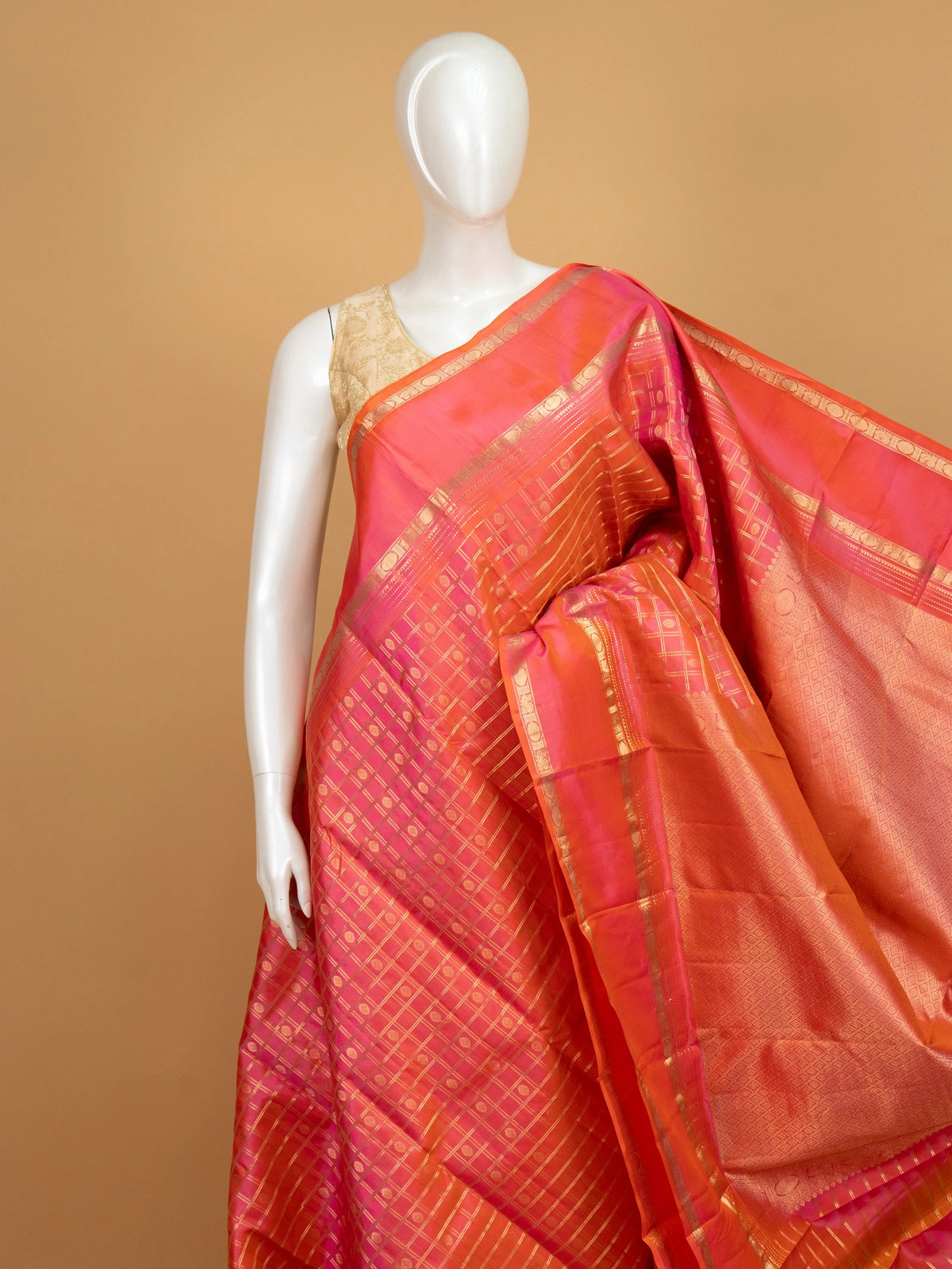Pink and orange pure Kanchipuram silk saree with gold zari checks and contrast border