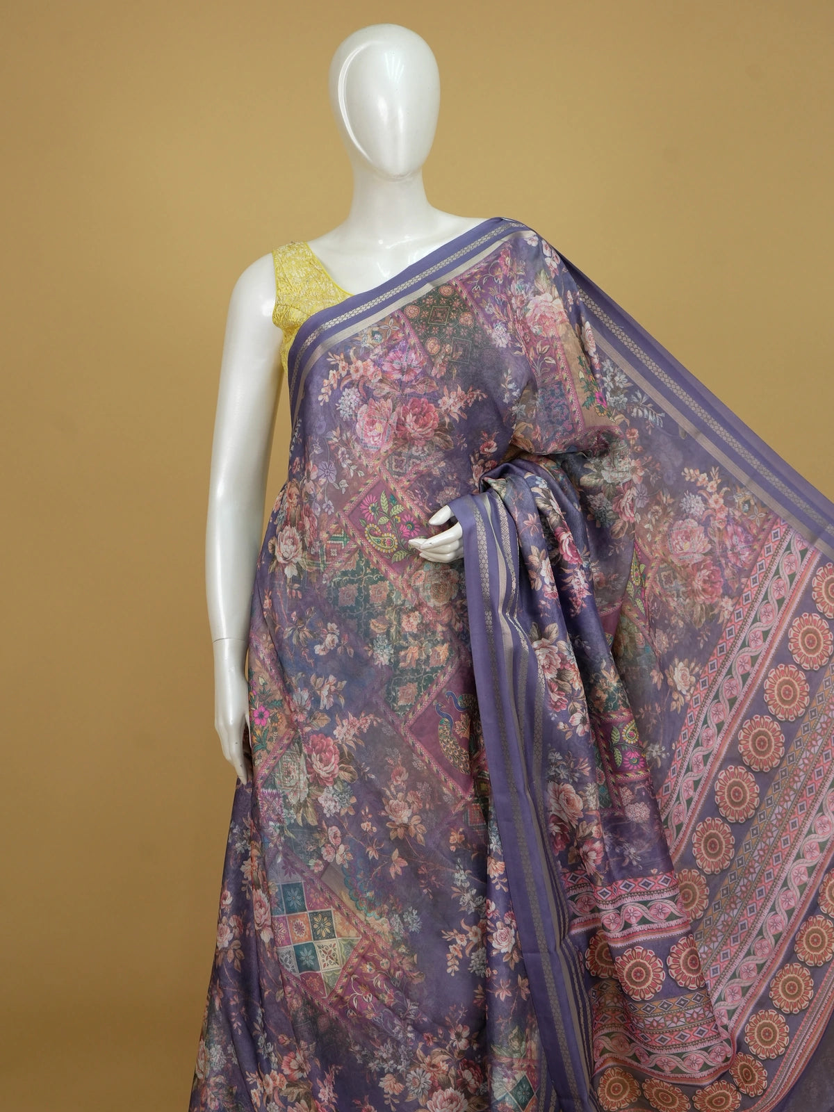 Purple and lavender organza designer saree with floral patchwork print and gold zari border