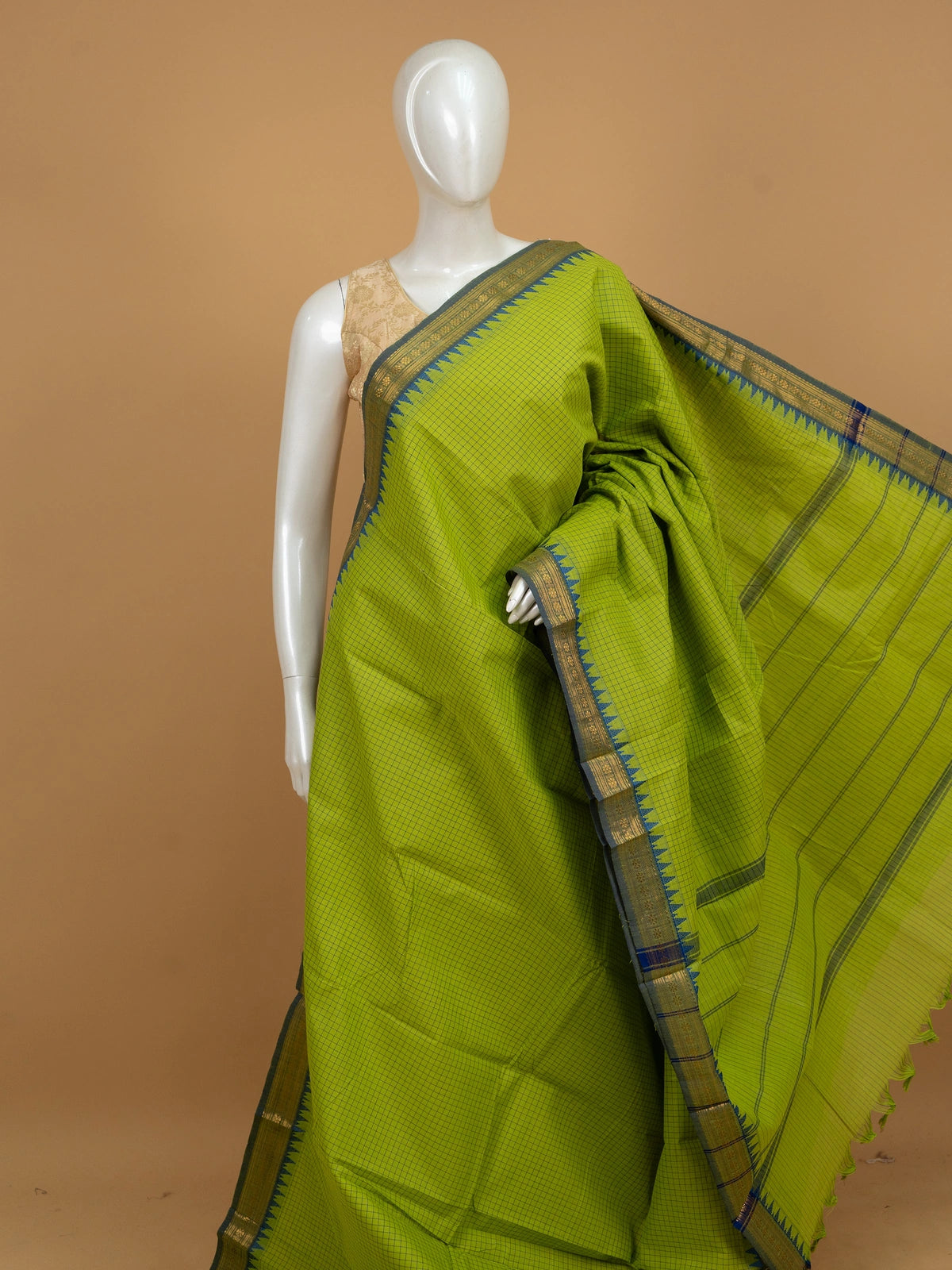 Parrot green Chettinad cotton saree with blue checked body and contrast blue temple zari border