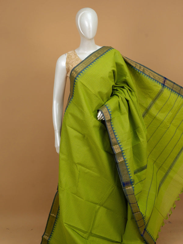 Parrot green Chettinad cotton saree with blue checked body and contrast blue temple zari border