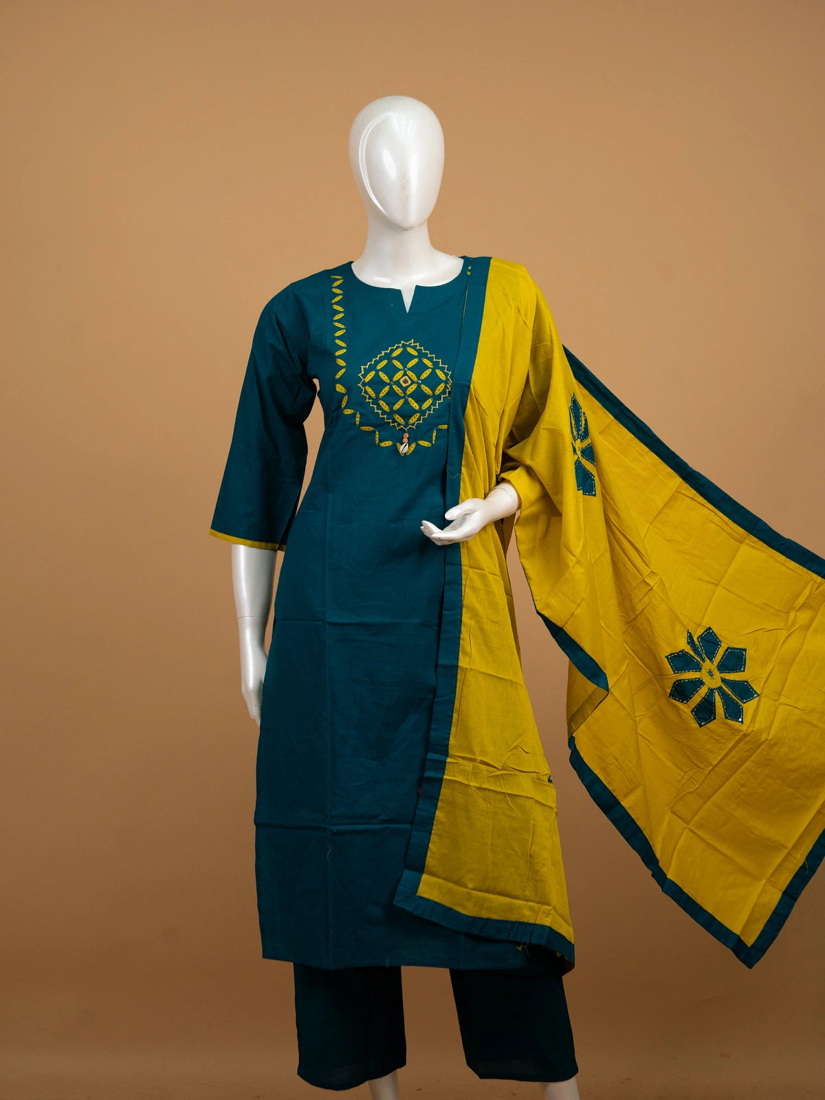 Teal cotton straight-cut kurti set with yellow mirror embroidery and contrasting mustard applique dupatta