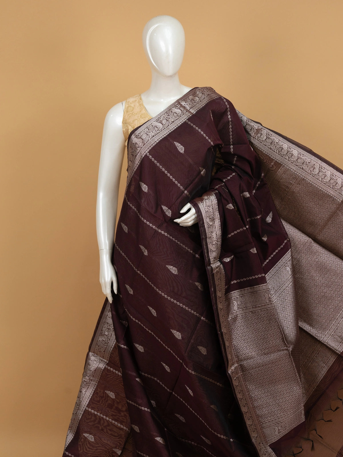 Wine silk cotton saree with silver zari buttas and contrast peacock-motif border