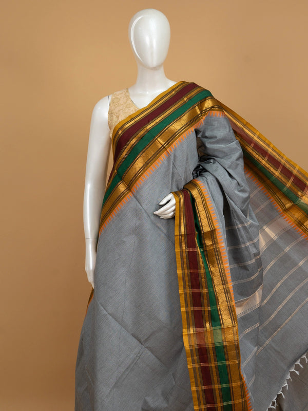 Grey Chettinad cotton saree with contrast mustard, maroon and green border and gold zari temple motifs