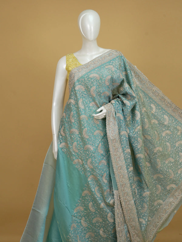 Sea green designer saree with allover gold zari floral and paisley embroidery and embellished border