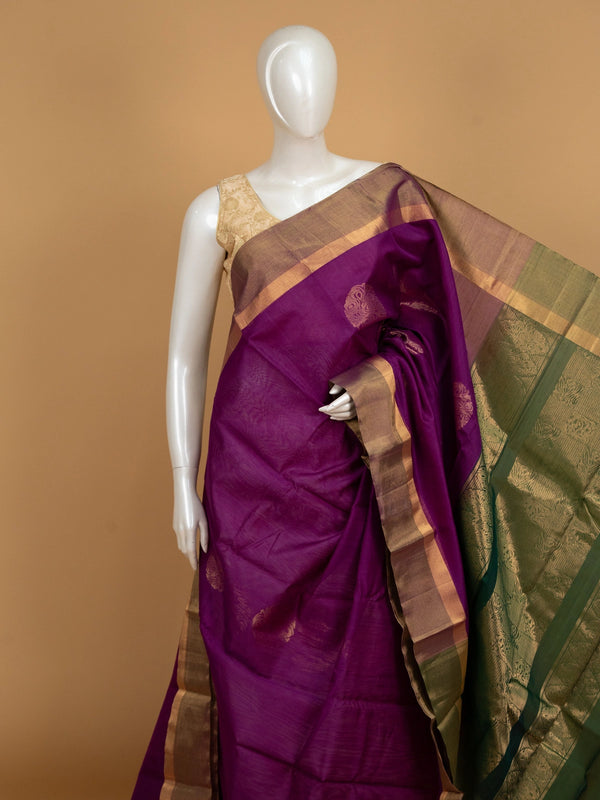 Magenta purple pure silk cotton saree with contrast green gold zari border and buttas