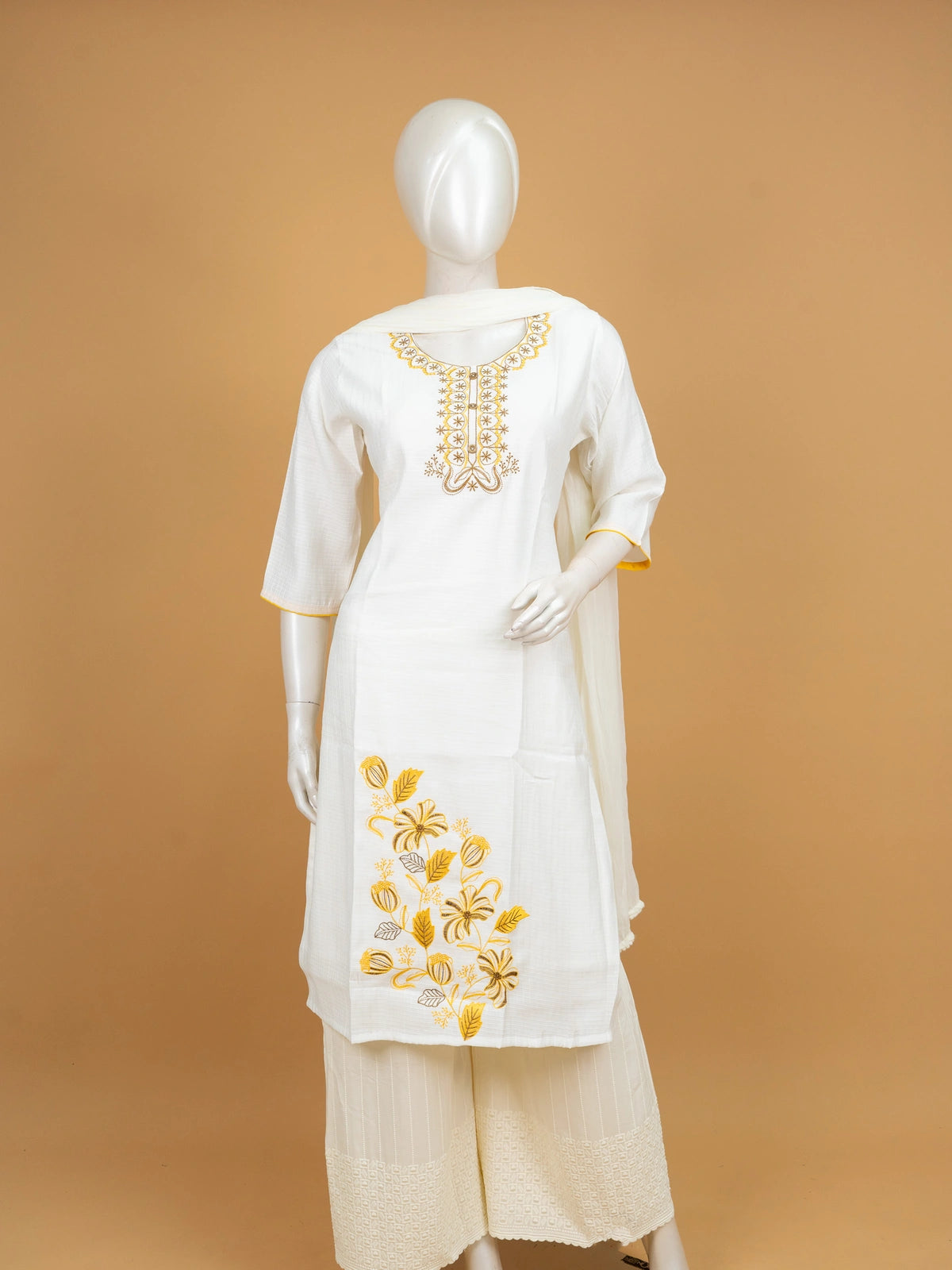 White cotton Anarkali kurti with yellow floral embroidery on neckline and hem