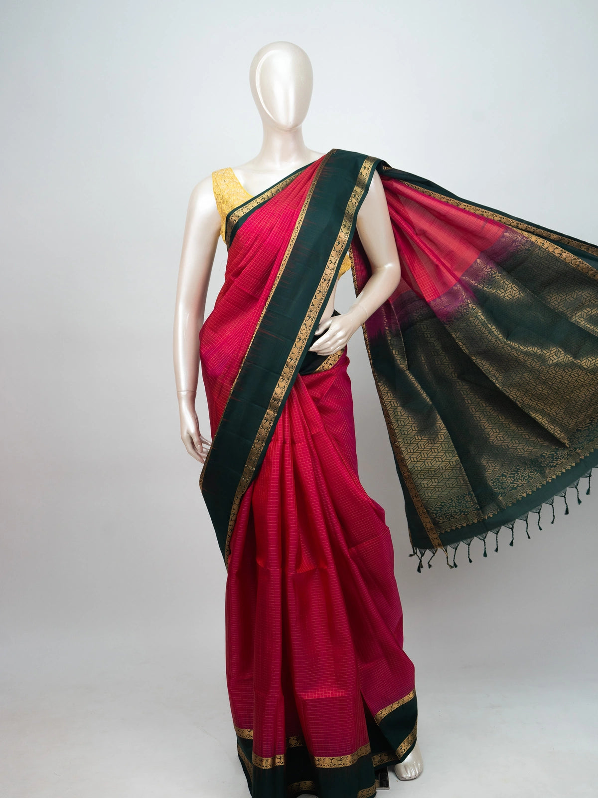 Pink soft silk saree with bottle-green contrast gold zari border and woven zari pallu