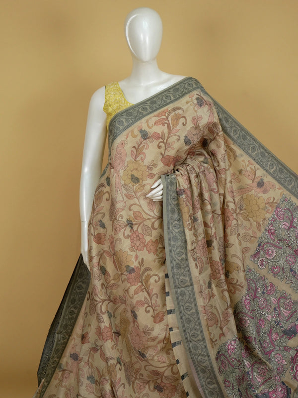 Beige linen cotton saree with Kalamkari floral print, parrot motifs and grey elephant pallu