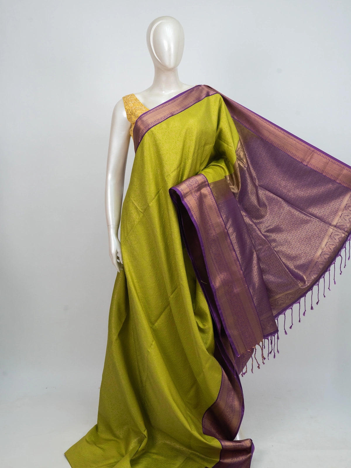 Lime green Kanchipuram Fancy Silk saree with contrast purple gold zari border and pallu