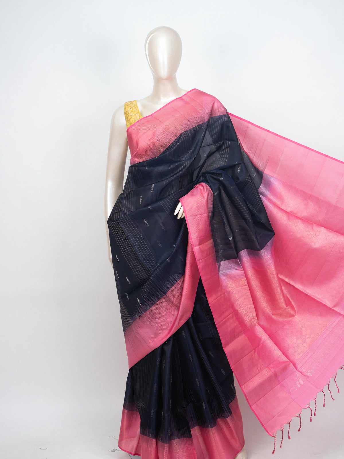 Navy blue soft silk saree with contrast pink zari border and pallu